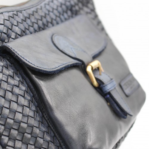 Bolsa de couro trançado...